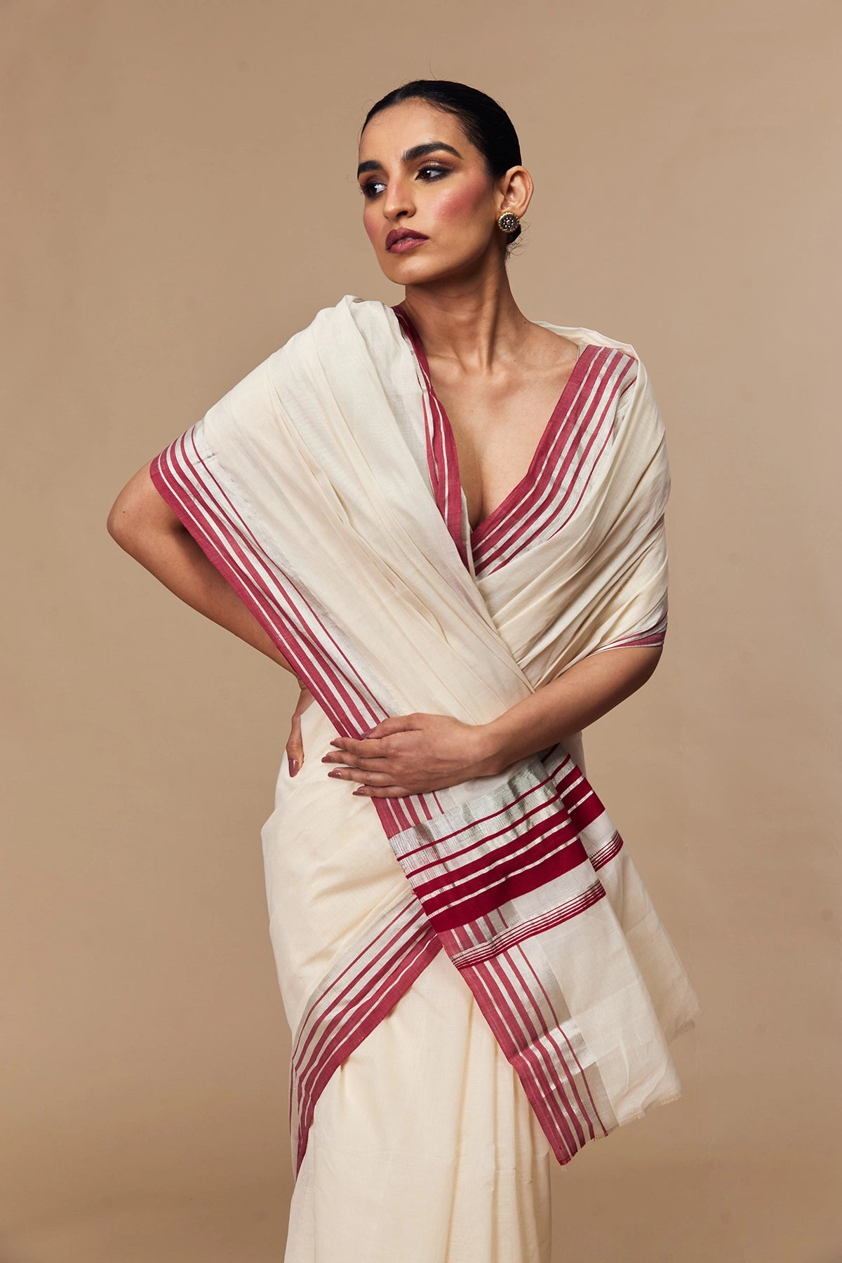 Close-up of Kerala handloom cotton saree with red and silver border