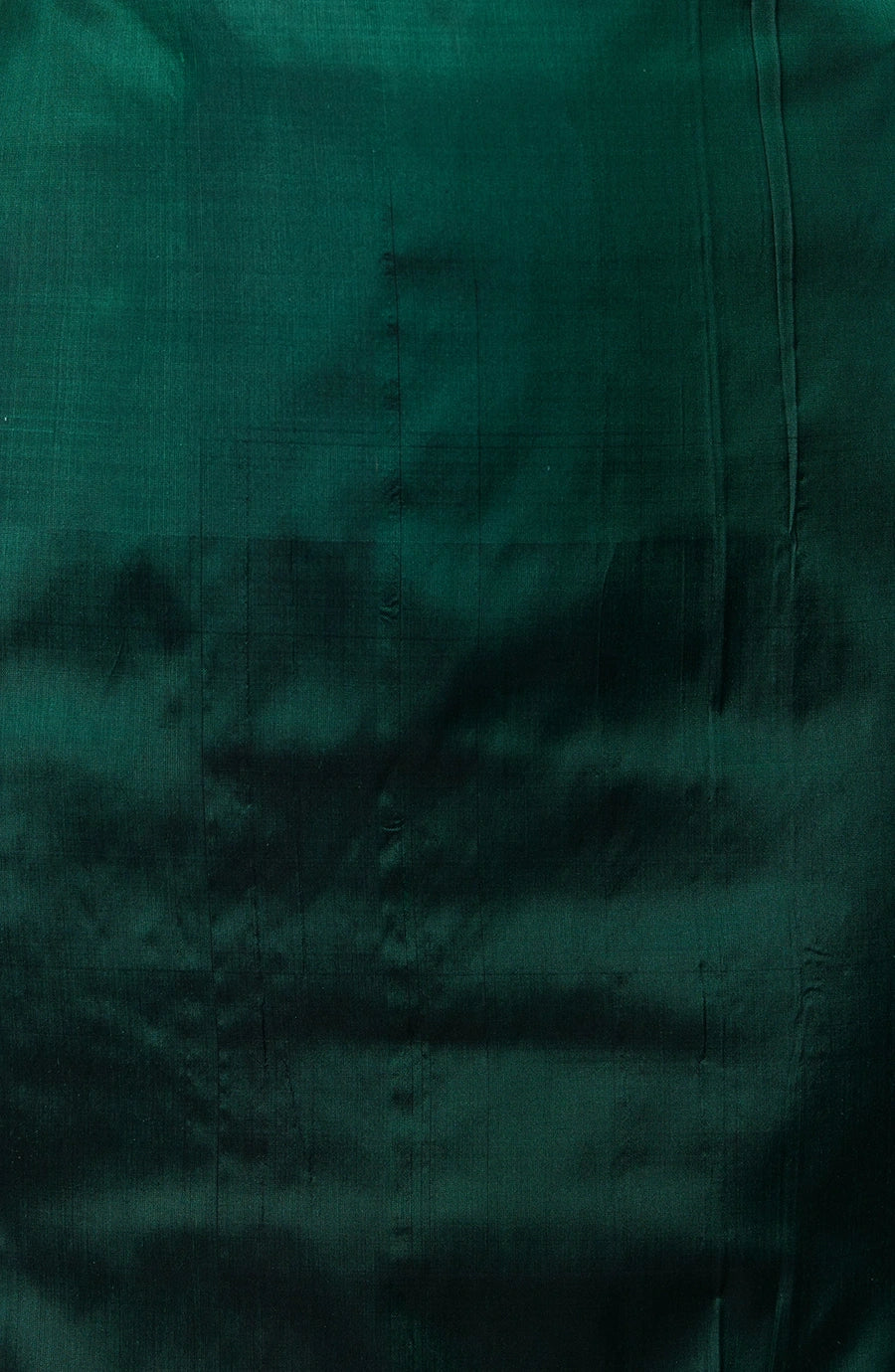 Matching unstitched green silk blouse piece with sheen finish