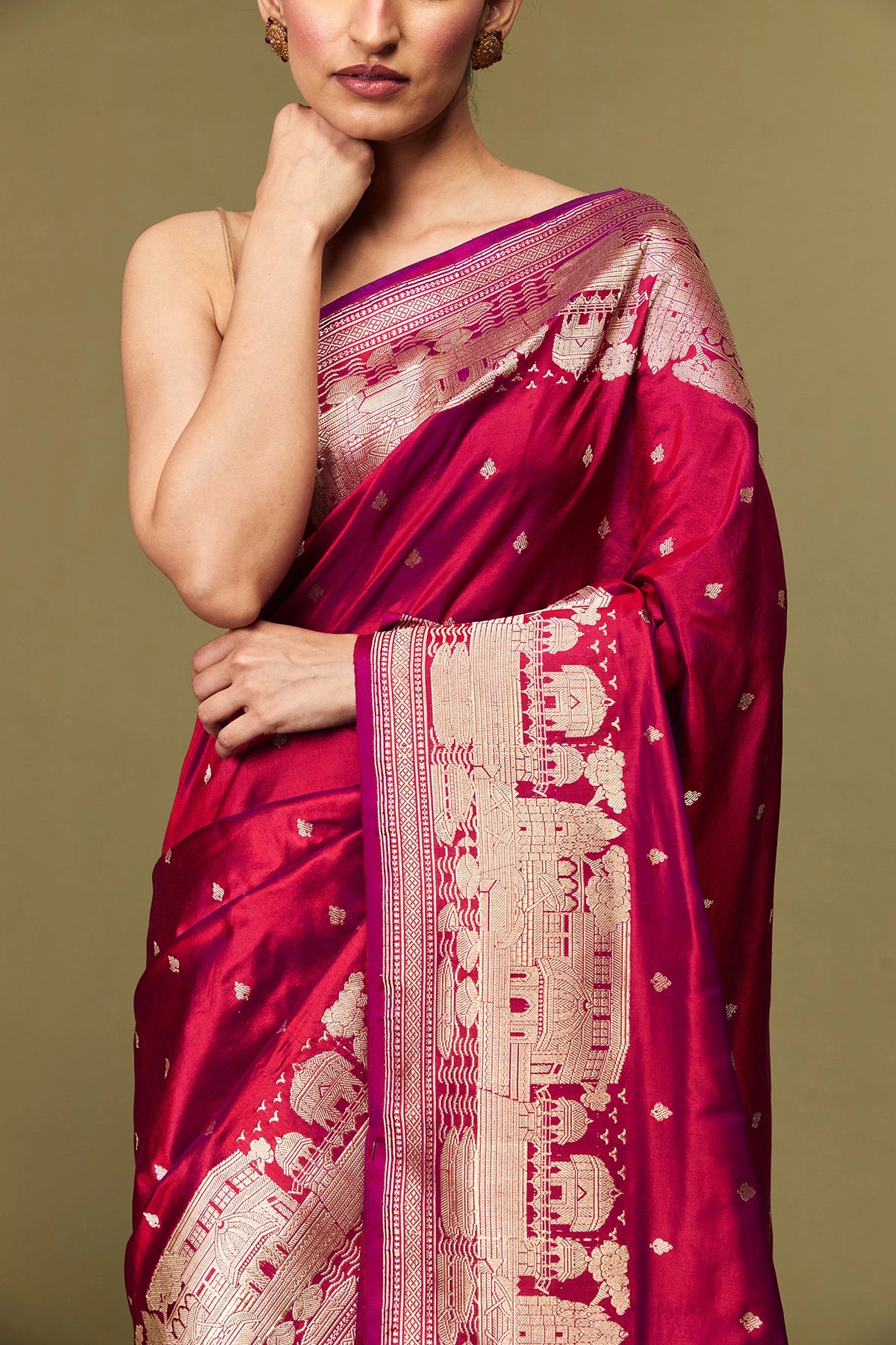 Close-up of Banaras Ghat motif pallu in antique gold zari weave