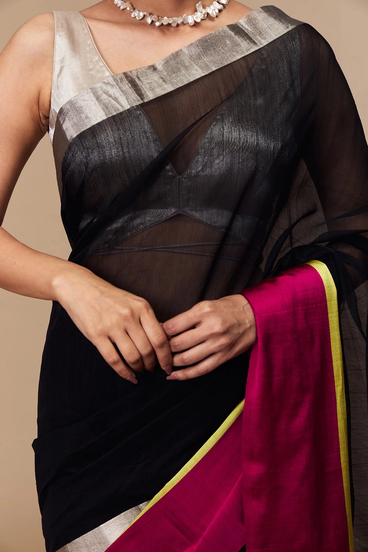 Model styling black Chanderi saree for festive occasion