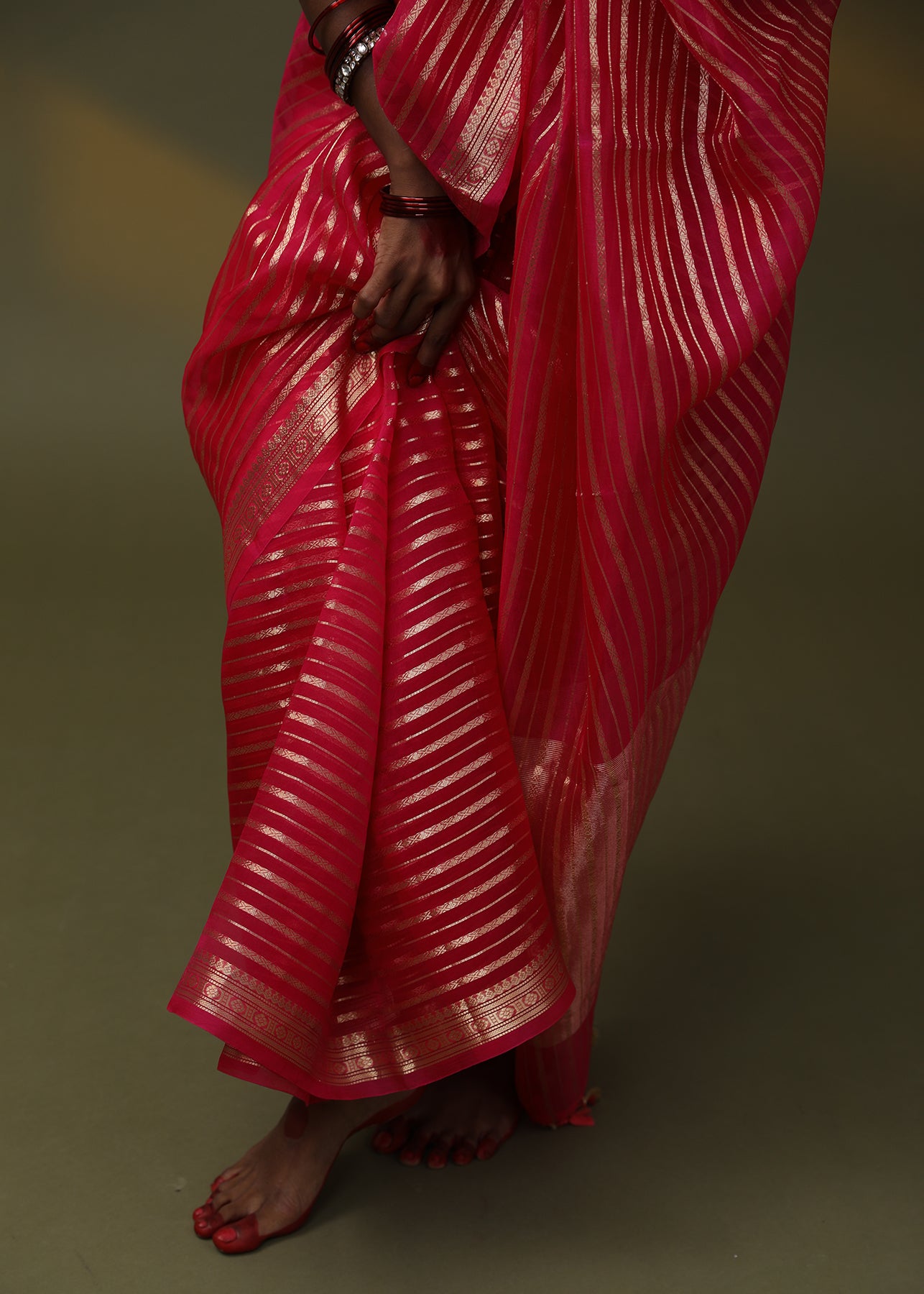 Image of a red Lehriya Organza Saree with Banarsi weaving