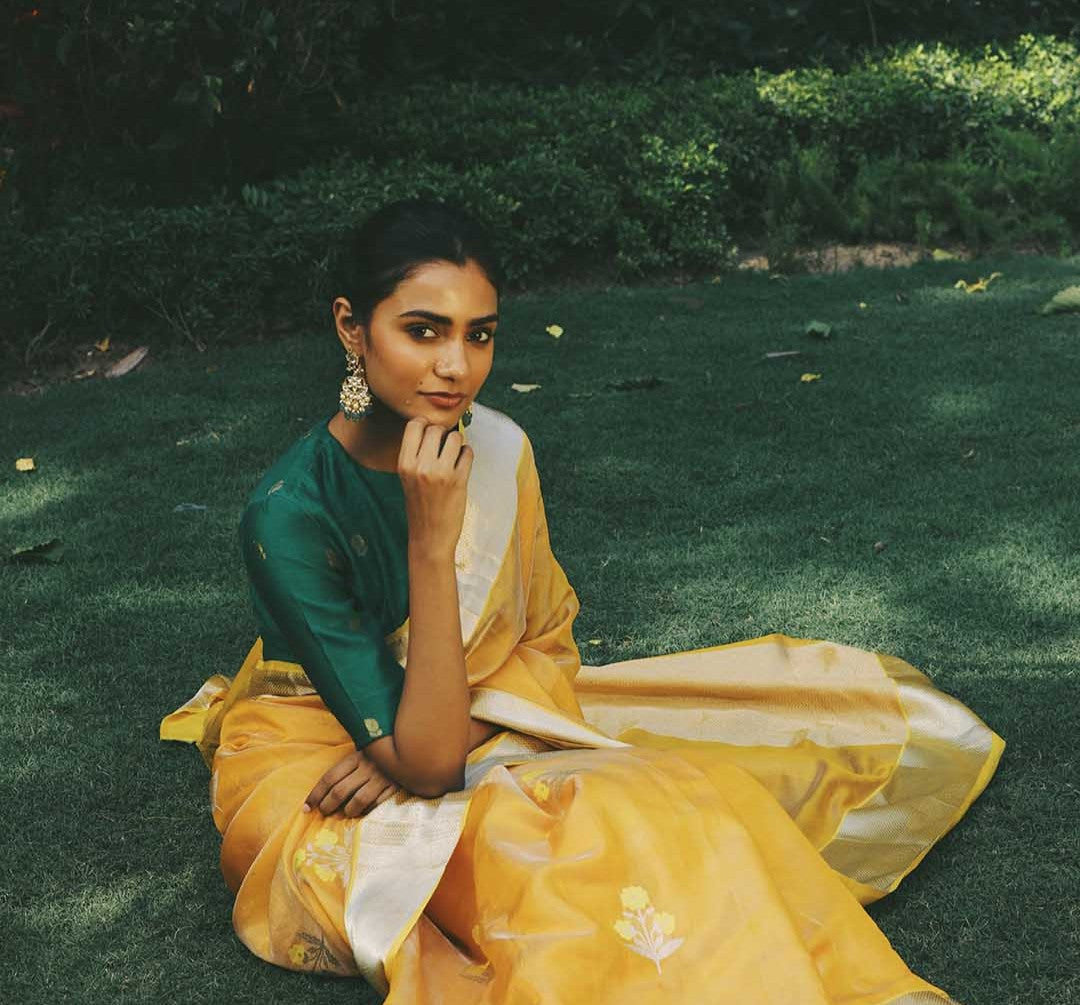 Handwoven Chanderi saree with zari border in soft pastel tones