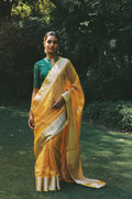 Yellow pure chanderi silk saree with zari border