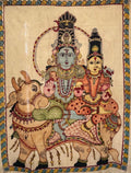 Hand-painted Kalamkari wall art of Lord Shiva and Parvati seated on Nandi with intricate traditional details