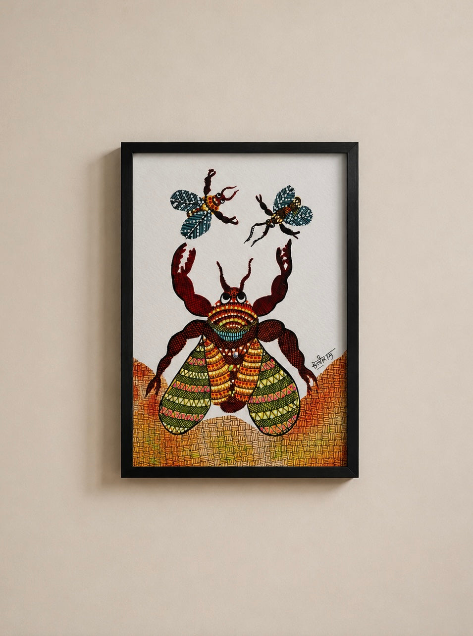 A framed art print featuring a colorful, patterned beetle and two butterflies on a white background, housed in a black frame and mounted on a beige wall.
