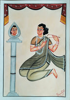 A traditional Indian folk art painting depicting a kneeling woman in a striped sari playing a flute, next to a stone pillar with a mirror showing her reflection. The background is a warm beige with red draped curtains at the top.