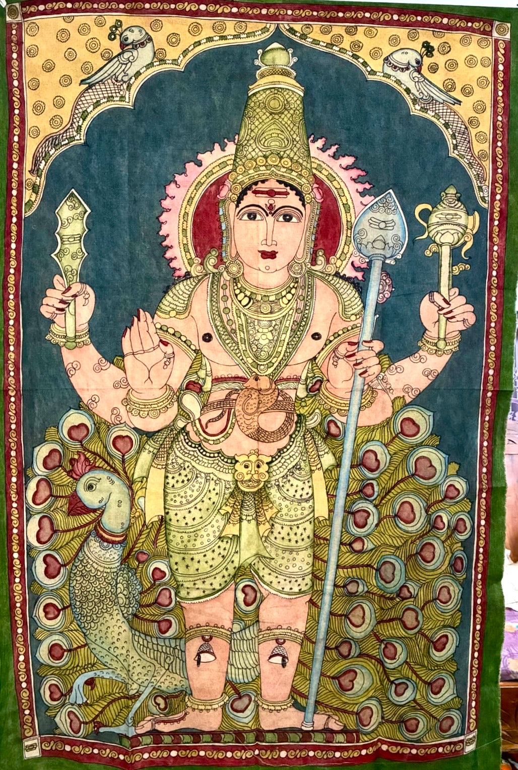 Hand-painted Kalamkari Lord Kartikeya wall art with Vel, peacock and intricate traditional details