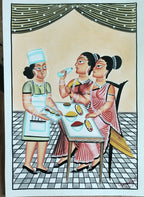 A traditional Indian folk art painting depicting a kitchen scene with three women around a table. One woman on the left wears a green apron and white hat while holding a tray.