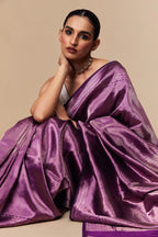 Intricate woven border of violet Tanchoi Banarasi silk saree