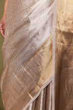 Golden woven border of handloom tissue Banarasi saree