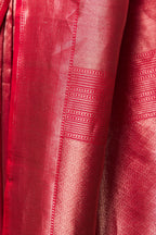 Close-up of pallu in crimson pink Banarasi saree with fine zari weave