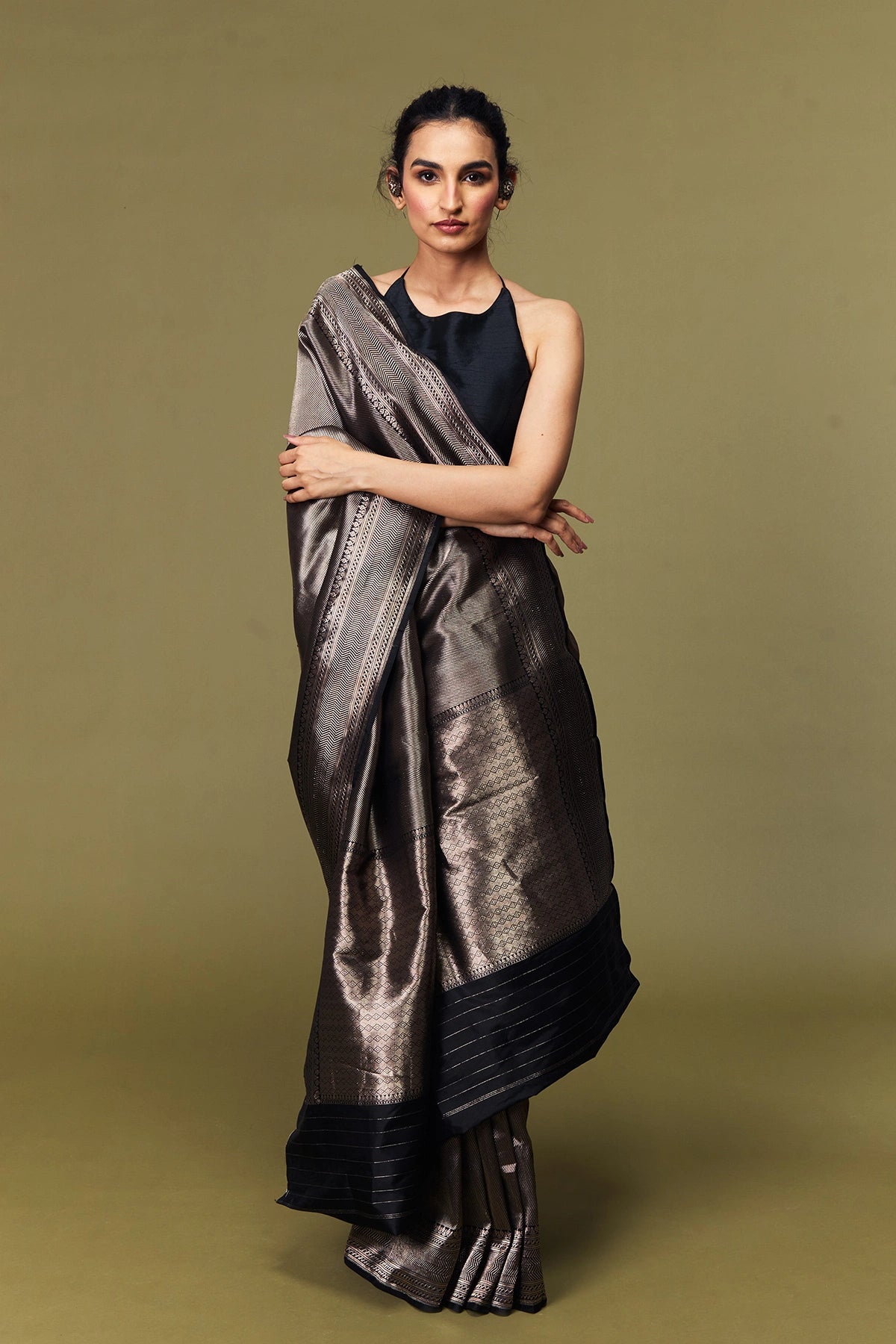 Model draped in black Banarasi Tanchoi silk saree with brocade pattern