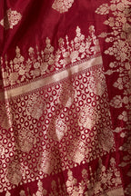 Close-up of floral zari pallu in maroon Banarasi mango silk saree