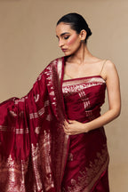 Soft and glossy mango silk fabric with woven zari butis