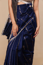 Handwoven silver motifs and diagonal layout on Katan silk