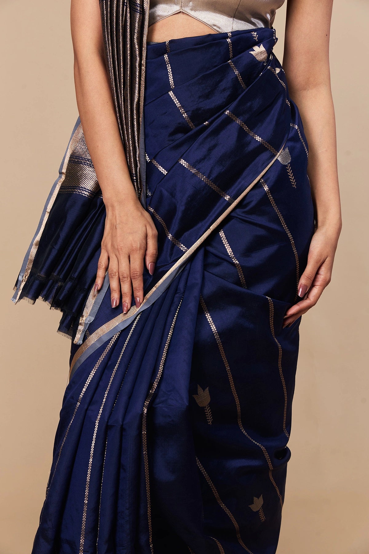 Handwoven silver motifs and diagonal layout on Katan silk