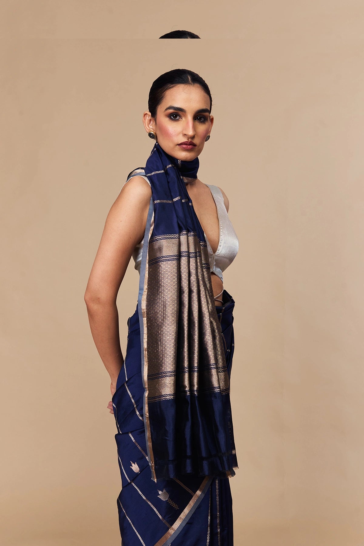 Detailed silver zari border on navy Kadwa Banarasi sare