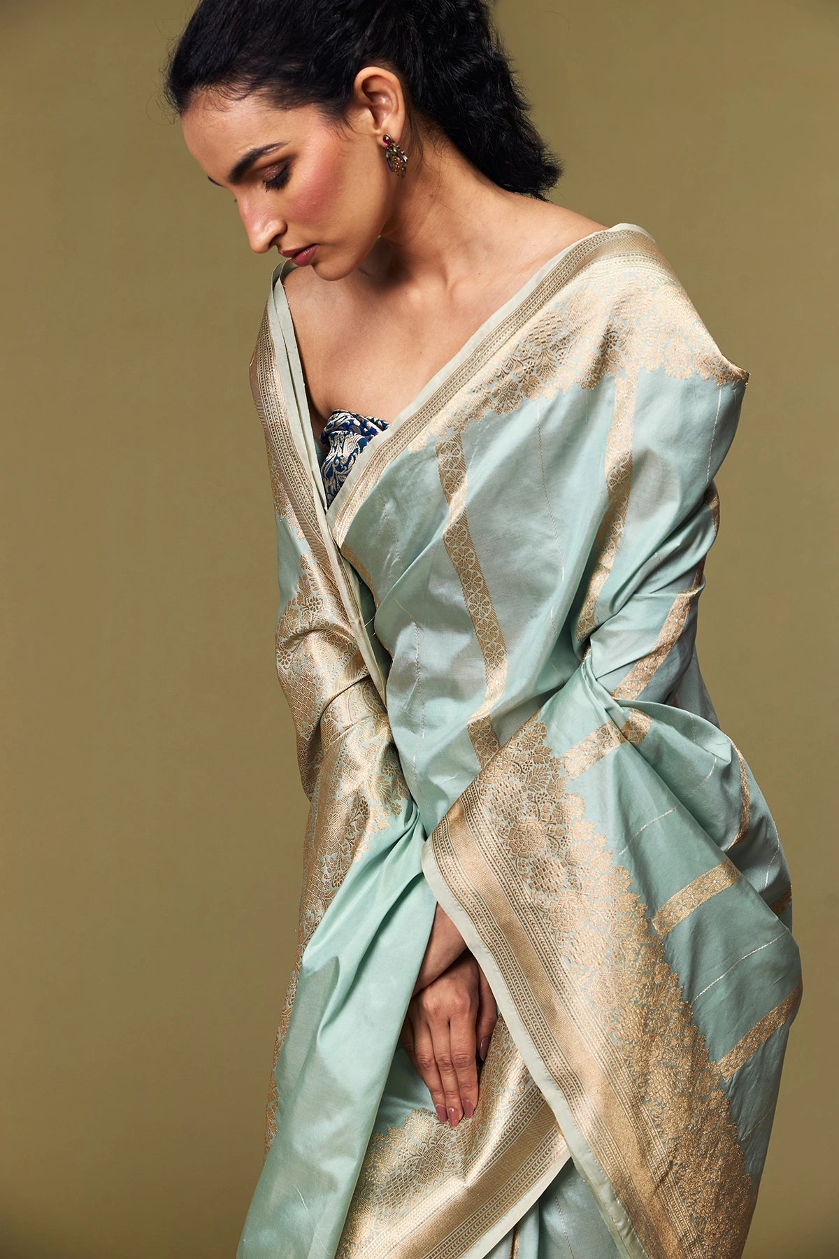 Soft Katan silk with handwoven floral and geometric butis in gold