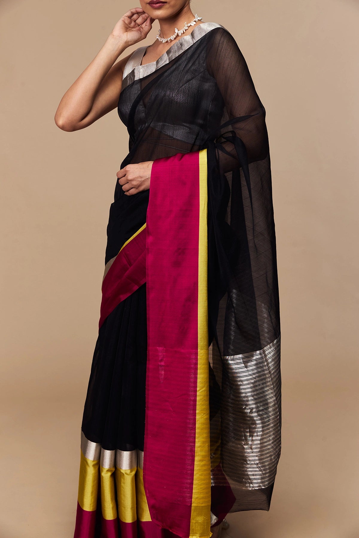 Pallu drape showing sheer black Chanderi texture