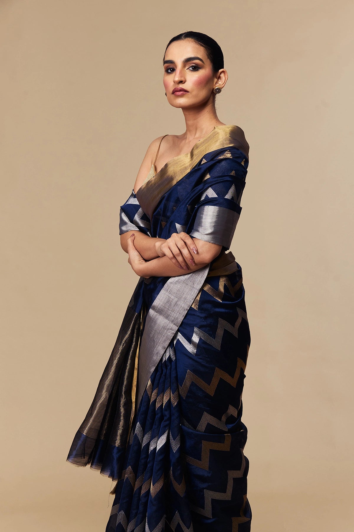 Draping texture of navy blue silk with zari work