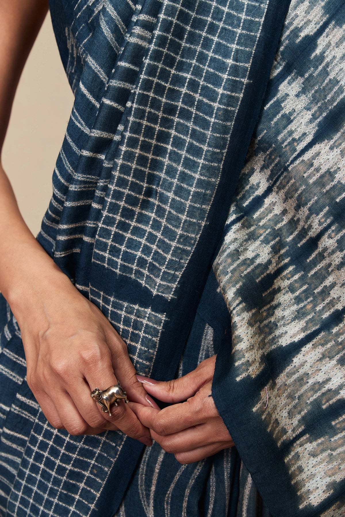 Artistic view highlighting the fall and natural texture of the saree