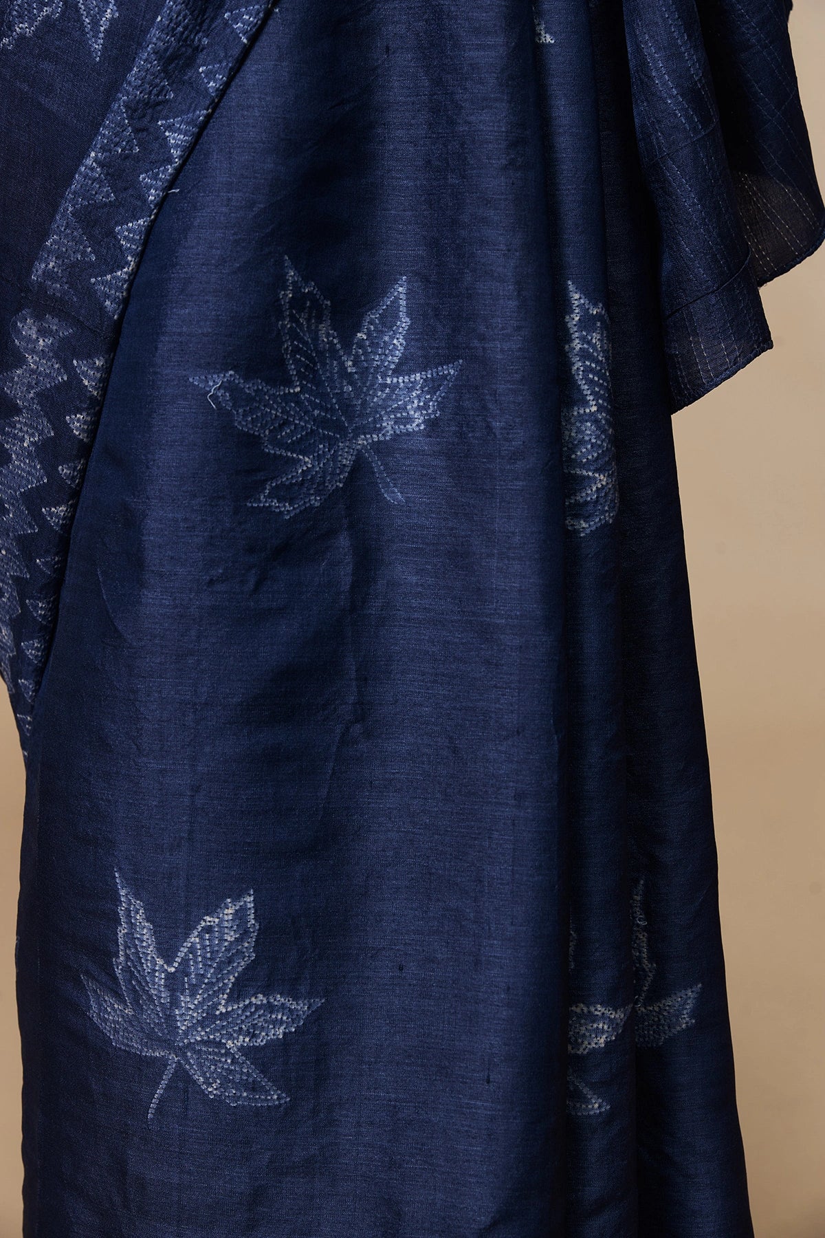 Detailed view of pallu showcasing traditional artistry