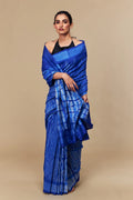 Model draped in electric blue Shibori mulberry silk saree