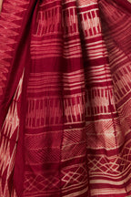Close-up of pallu showing layered Shibori lines and grids