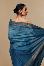 Contrast pallu and pleats featuring light blue resist-dye motifs